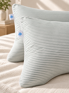 Détail des finitions d’une taie rayée Sleepillo Plus